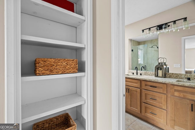 1190 Plantation Dr, Villa Rica, GA 30180 - bathroom with a sink, double vanity, a shower stall, and tile patterned floors