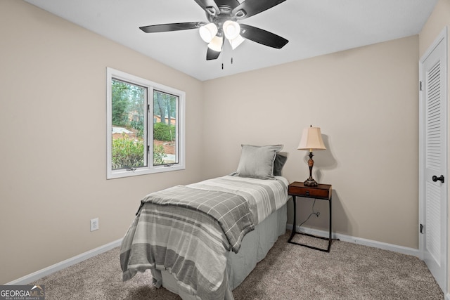 1190 Plantation Dr, Villa Rica, GA 30180 - carpeted bedroom featuring a ceiling fan, baseboards, and a closet