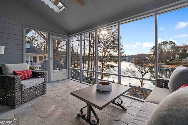 1190 Plantation Dr, Villa Rica, GA 30180 - sunroom with a water view, a healthy amount of sunlight, ceiling fan, and vaulted ceiling