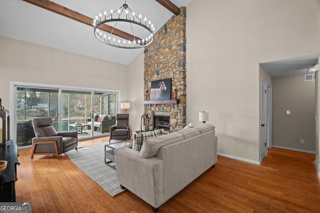 1190 Plantation Dr, Villa Rica, GA 30180 - living area with beam ceiling, baseboards, visible vents, and wood-type flooring