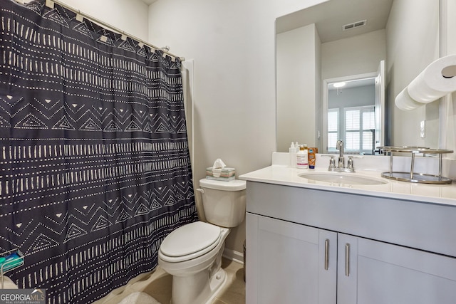 full bath with a shower with shower curtain, visible vents, toilet, and vanity