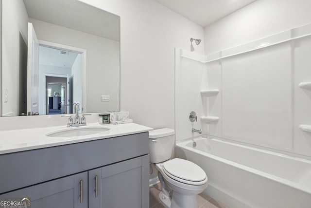 bathroom featuring visible vents, tub / shower combination, toilet, tile patterned floors, and vanity