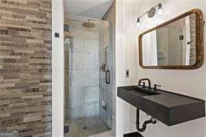 full bath featuring a stall shower