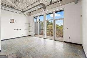 empty room with baseboards