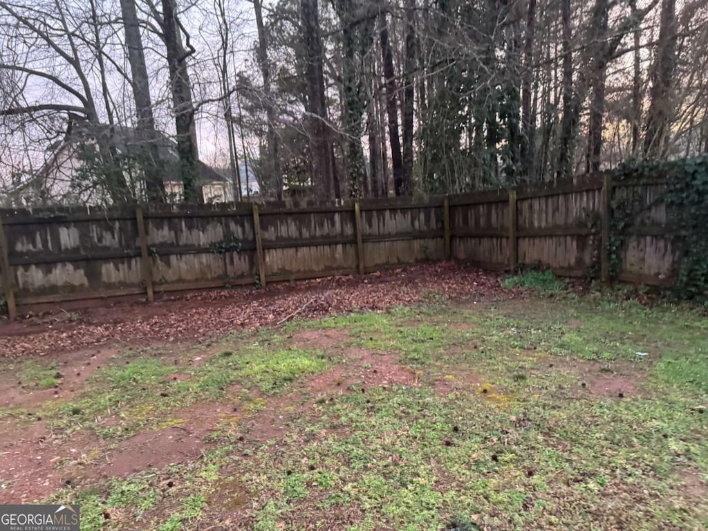view of yard with fence