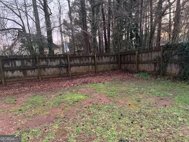 view of yard with fence