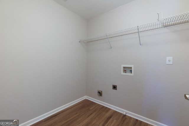 washroom with baseboards, laundry area, hookup for a washing machine, dark wood-style floors, and hookup for an electric dryer
