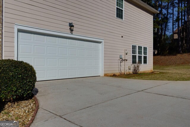 garage with driveway