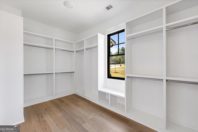 104 Piedmont Cir, Forsyth, GA 31029 - walk in closet with wood-type flooring