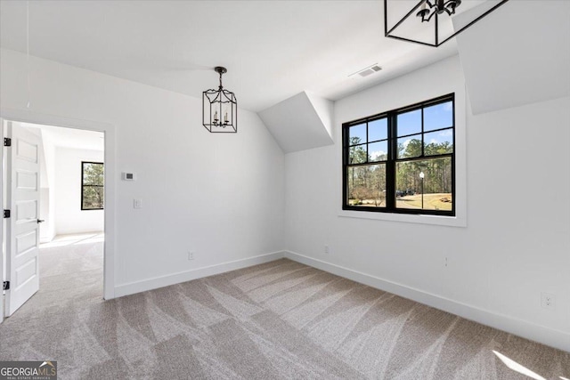 104 Piedmont Cir, Forsyth, GA 31029 - additional living space featuring carpet floors, healthy amount of natural light, baseboards, and vaulted ceiling