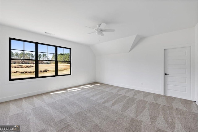 104 Piedmont Cir, Forsyth, GA 31029 - additional living space featuring ceiling fan, carpet floors, baseboards, and lofted ceiling