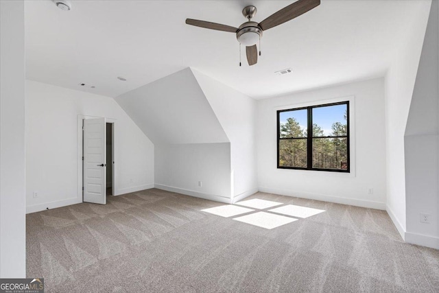 104 Piedmont Cir, Forsyth, GA 31029 - bonus room featuring carpet, a ceiling fan, baseboards, and vaulted ceiling