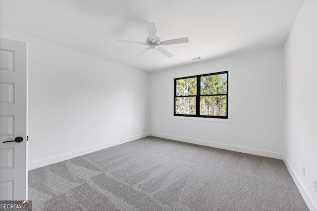104 Piedmont Cir, Forsyth, GA 31029 - carpeted empty room with a ceiling fan and baseboards