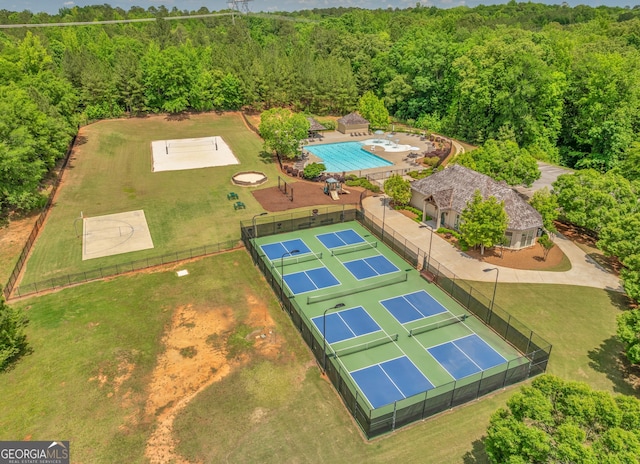 104 Piedmont Cir, Forsyth, GA 31029 - aerial view of a forest and a pool
