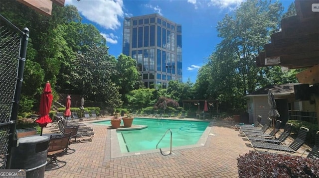 1250 Parkwood Cir SE Unit 300/230, Atlanta, GA 30339 - community pool with a patio area