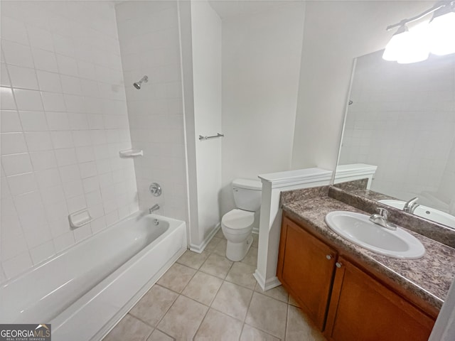 1250 Parkwood Cir SE Unit 300/230, Atlanta, GA 30339 - full bath featuring tile patterned floors, toilet, vanity, washtub / shower combination, and baseboards