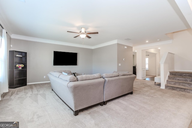 3391 Meadow Grass Dr, Dacula, GA 30019 - living room with carpet, a ceiling fan, stairs, crown molding, and baseboards
