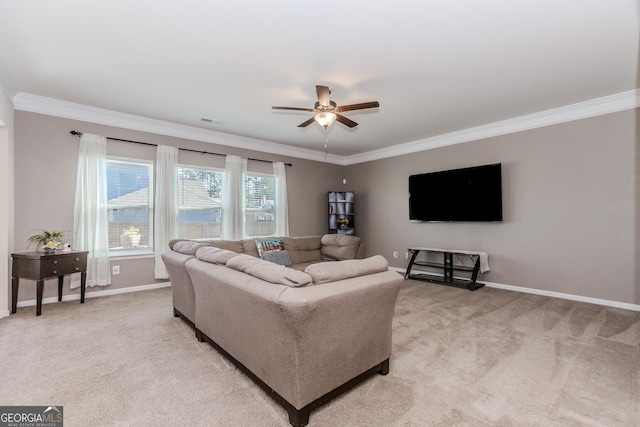 3391 Meadow Grass Dr, Dacula, GA 30019 - living area with crown molding, a ceiling fan, light carpet, and baseboards