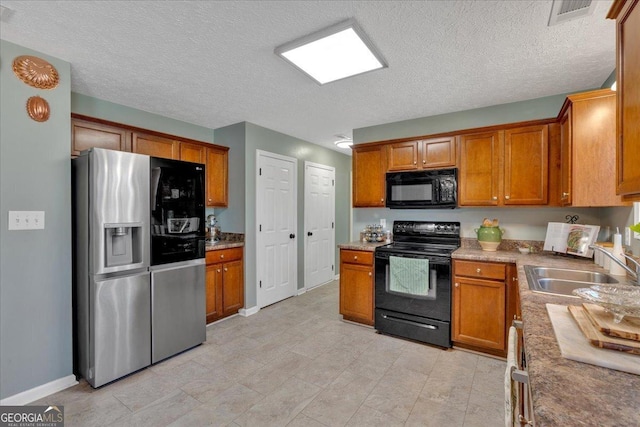 81 Summer Creek Dr, Dallas, GA 30157 - kitchen featuring brown cabinets, black appliances, and a sink