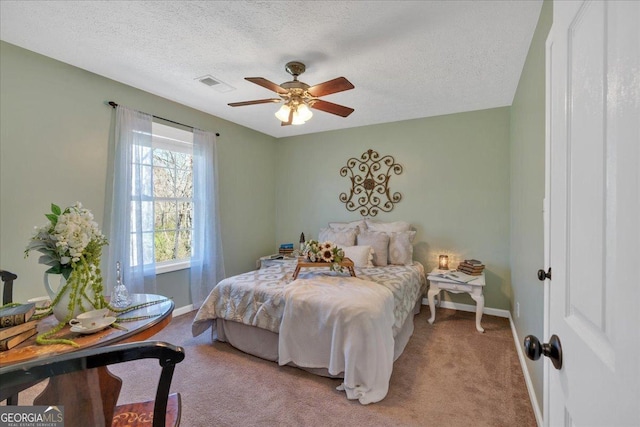 81 Summer Creek Dr, Dallas, GA 30157 - bedroom featuring a ceiling fan, baseboards, visible vents, a textured ceiling, and carpet flooring