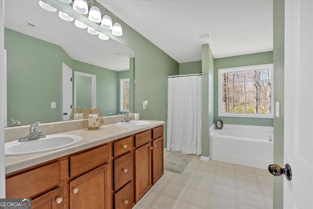 81 Summer Creek Dr, Dallas, GA 30157 - bathroom featuring a sink, visible vents, a garden tub, and tile patterned floors