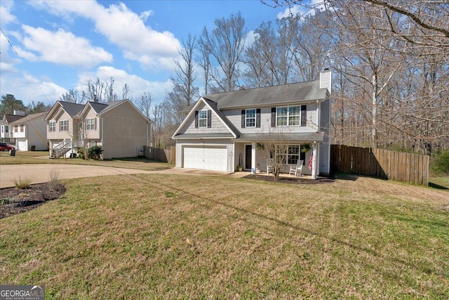 81 Summer Creek Dr, Dallas, GA 30157 - traditional-style home with a front yard, fence, driveway, a porch, and a chimney