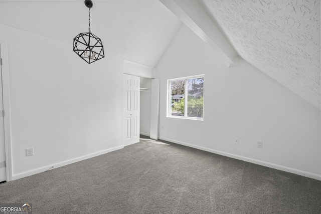 bonus room with lofted ceiling with beams, a textured ceiling, baseboards, and carpet