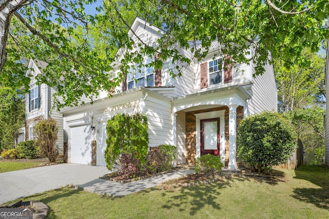 3258 Welmingham Dr SW, Atlanta, GA 30331 - view of front of property with a front lawn, driveway, and a garage
