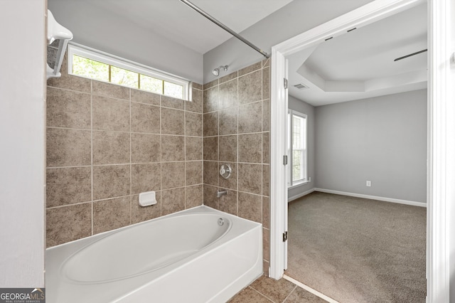 3258 Welmingham Dr SW, Atlanta, GA 30331 - full bath with baseboards, visible vents, a healthy amount of sunlight, and shower / bathing tub combination