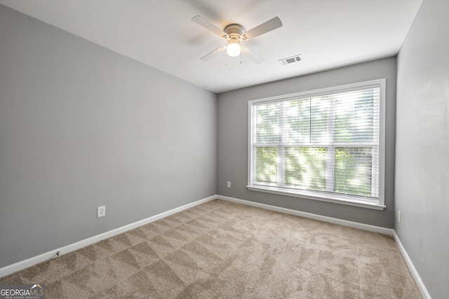 3258 Welmingham Dr SW, Atlanta, GA 30331 - unfurnished room featuring a ceiling fan, visible vents, carpet floors, and baseboards