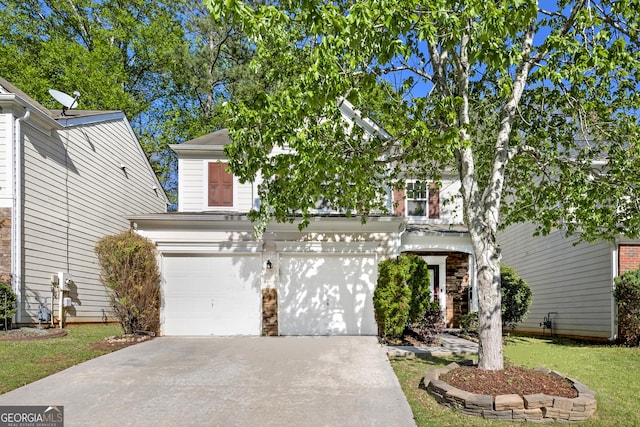 3258 Welmingham Dr SW, Atlanta, GA 30331 - view of front of property featuring a garage, a front yard, and concrete driveway
