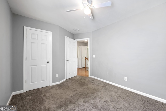 3258 Welmingham Dr SW, Atlanta, GA 30331 - unfurnished bedroom with baseboards, visible vents, ceiling fan, and carpet floors