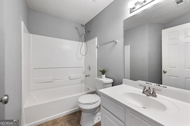 3258 Welmingham Dr SW, Atlanta, GA 30331 - full bath with visible vents, toilet, shower / washtub combination, vanity, and tile patterned flooring
