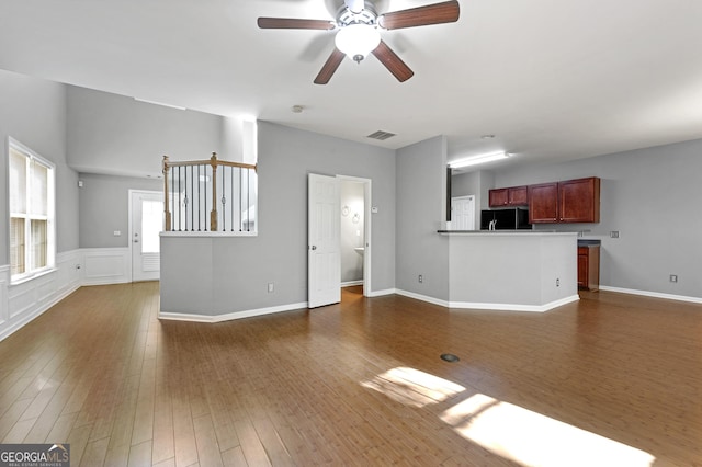 3258 Welmingham Dr SW, Atlanta, GA 30331 - unfurnished living room featuring a ceiling fan, visible vents, and dark wood finished floors