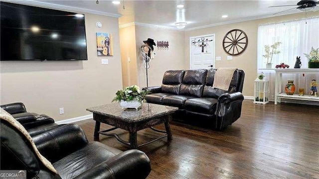 living area with baseboards, crown molding, ceiling fan, and wood finished floors