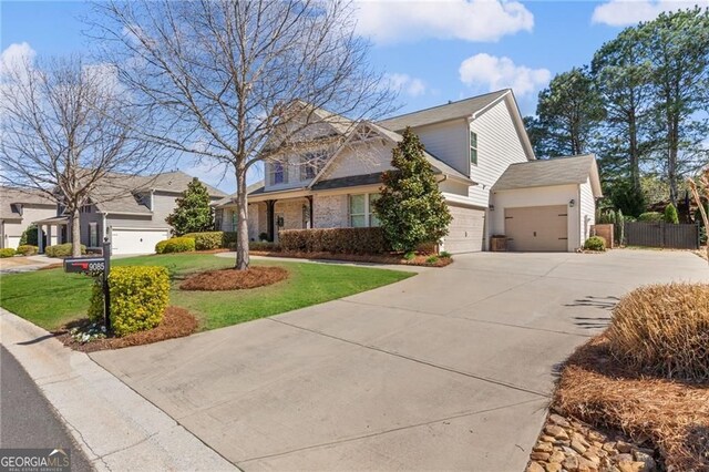 9085 Maple Run Trl, Gainesville, GA 30506 - view of front of house with fence and a front lawn