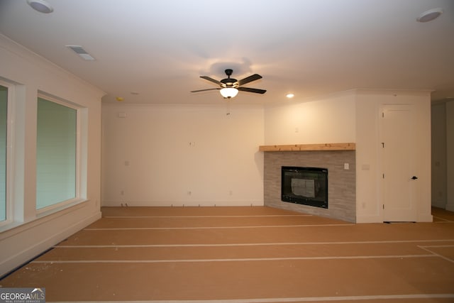 2044 Ripple Park Bnd, Canton, GA 30114 - unfurnished living room with a fireplace, crown molding, and ceiling fan