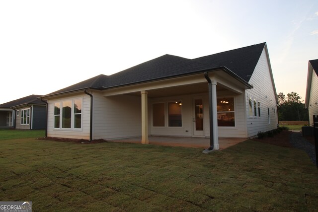 2044 Ripple Park Bnd, Canton, GA 30114 - rear view of house with a patio and a lawn