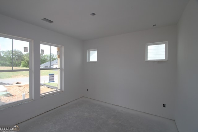 2044 Ripple Park Bnd, Canton, GA 30114 - spare room featuring concrete floors