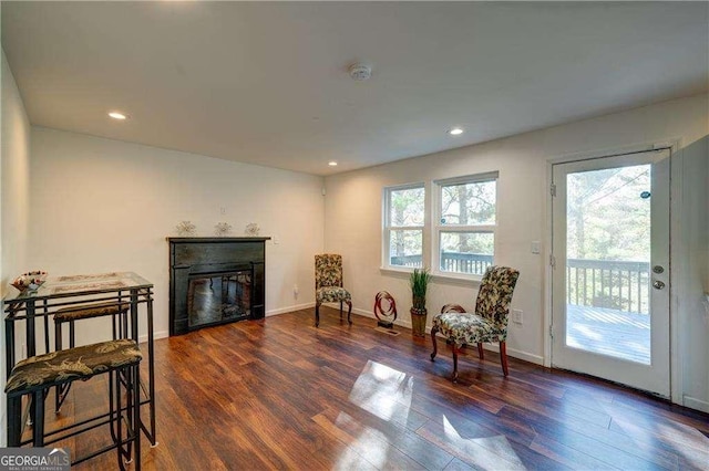 77 Hunters Grn, Dallas, GA 30157 - living area with a glass covered fireplace, baseboards, and wood finished floors