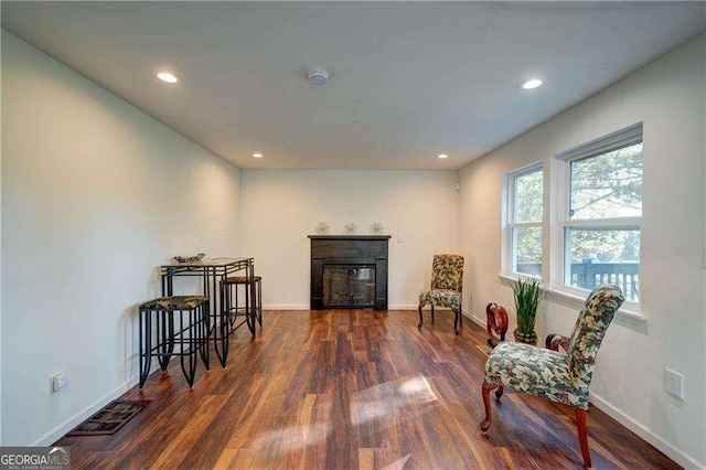 77 Hunters Grn, Dallas, GA 30157 - sitting room featuring visible vents, baseboards, a glass covered fireplace, and wood finished floors
