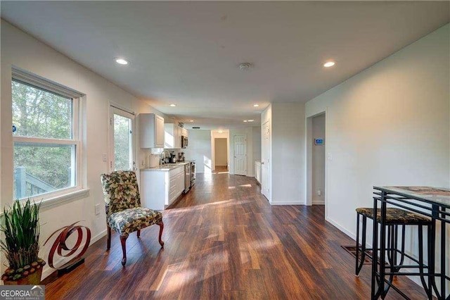 77 Hunters Grn, Dallas, GA 30157 - hall featuring recessed lighting, baseboards, and dark wood-style flooring