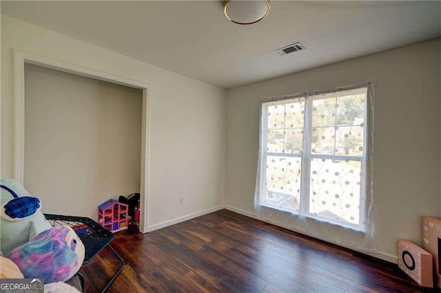 77 Hunters Grn, Dallas, GA 30157 - interior space with baseboards, visible vents, dark wood-style flooring, and a healthy amount of sunlight