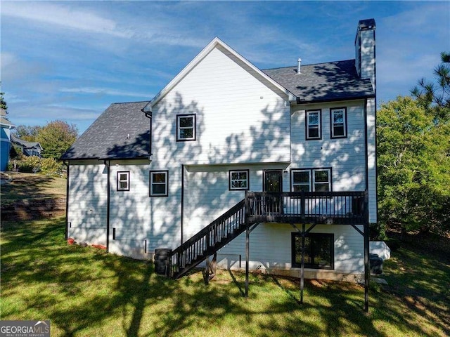 77 Hunters Grn, Dallas, GA 30157 - rear view of house with a chimney, a lawn, a wooden deck, and roof with shingles