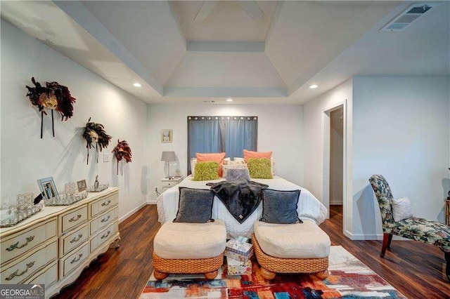 77 Hunters Grn, Dallas, GA 30157 - bedroom featuring dark wood finished floors, visible vents, recessed lighting, and a tray ceiling