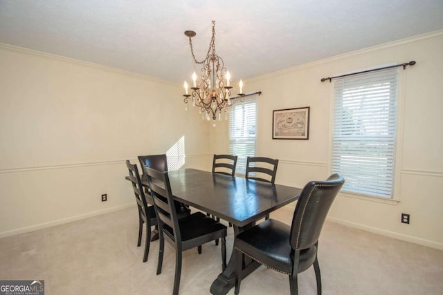 207 Lakeshore Way, Lagrange, GA 30240 - dining area featuring a chandelier, light colored carpet, and crown molding