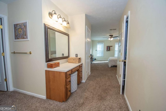 207 Lakeshore Way, Lagrange, GA 30240 - bathroom featuring carpet floors, vanity, a ceiling fan, and connected bathroom