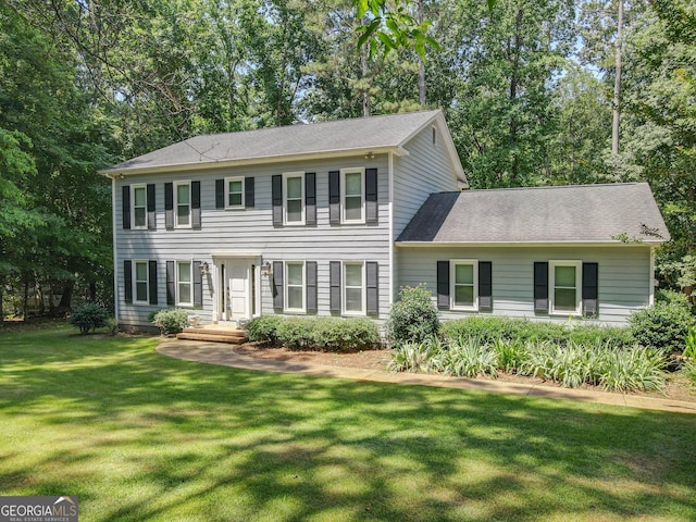 207 Lakeshore Way, Lagrange, GA 30240 - colonial home with a front yard and view of scattered trees