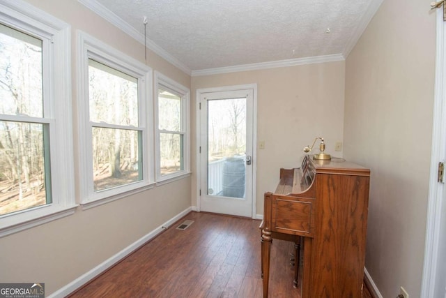 207 Lakeshore Way, Lagrange, GA 30240 - entryway with hardwood / wood-style floors, a textured ceiling, and ornamental molding