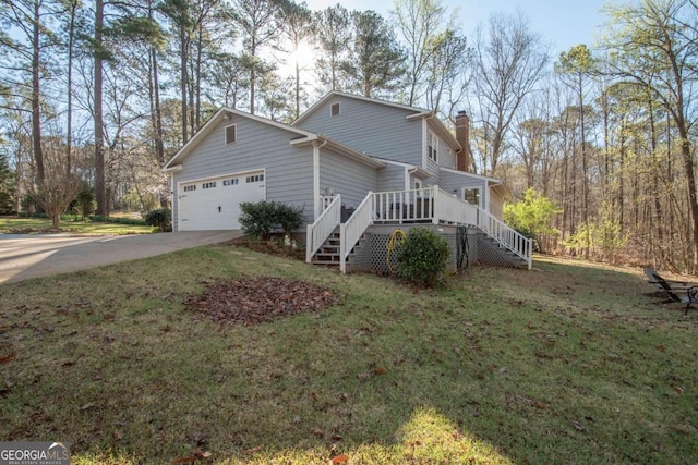207 Lakeshore Way, Lagrange, GA 30240 - view of side of property featuring stairway, a chimney, a lawn, and driveway